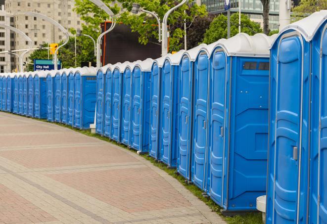 hygienic portable restrooms lined up at a beach party, ensuring guests have access to the necessary facilities while enjoying the sun and sand in Brooklyn Park