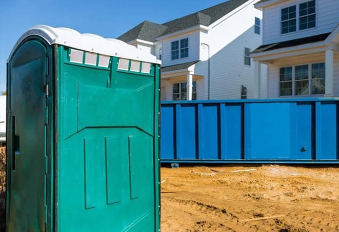 row of porta potties providing essential facilities at a construction site